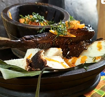 Traditional African Meal - Grilled Fish and Yam